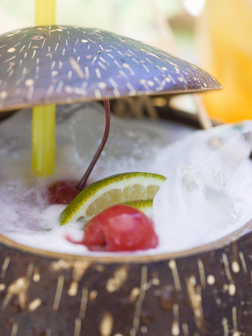 Pina Colada with cherries and lime (close-up)