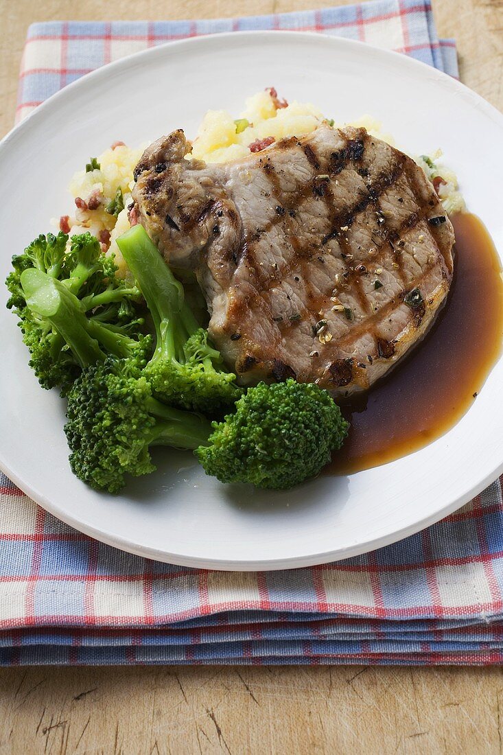 Pork chop with broccoli and mashed potato
