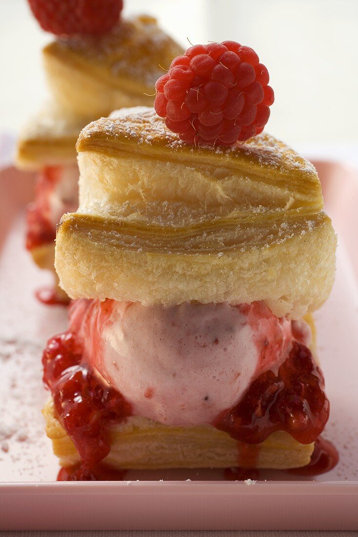 Puff pastries with raspberry ice cream and raspberry jam