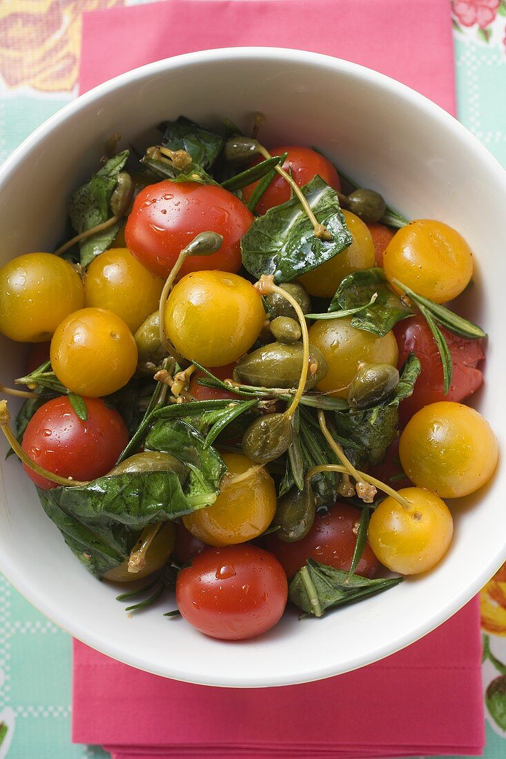 Tomato salad with capers and herbs (overhead view)