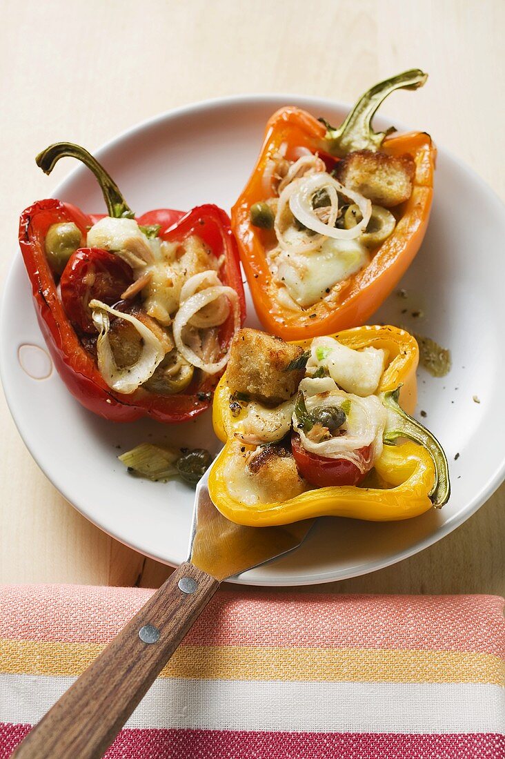 Peppers stuffed with white bread, olives, onions