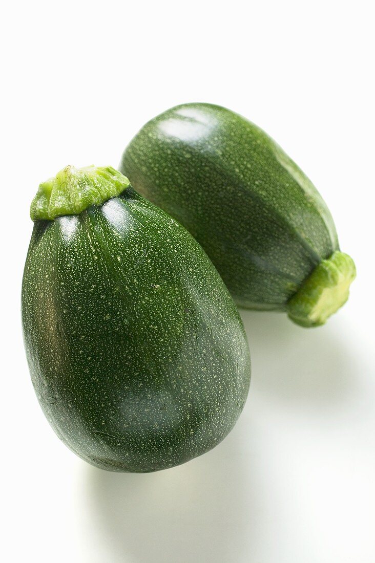 Two round courgettes