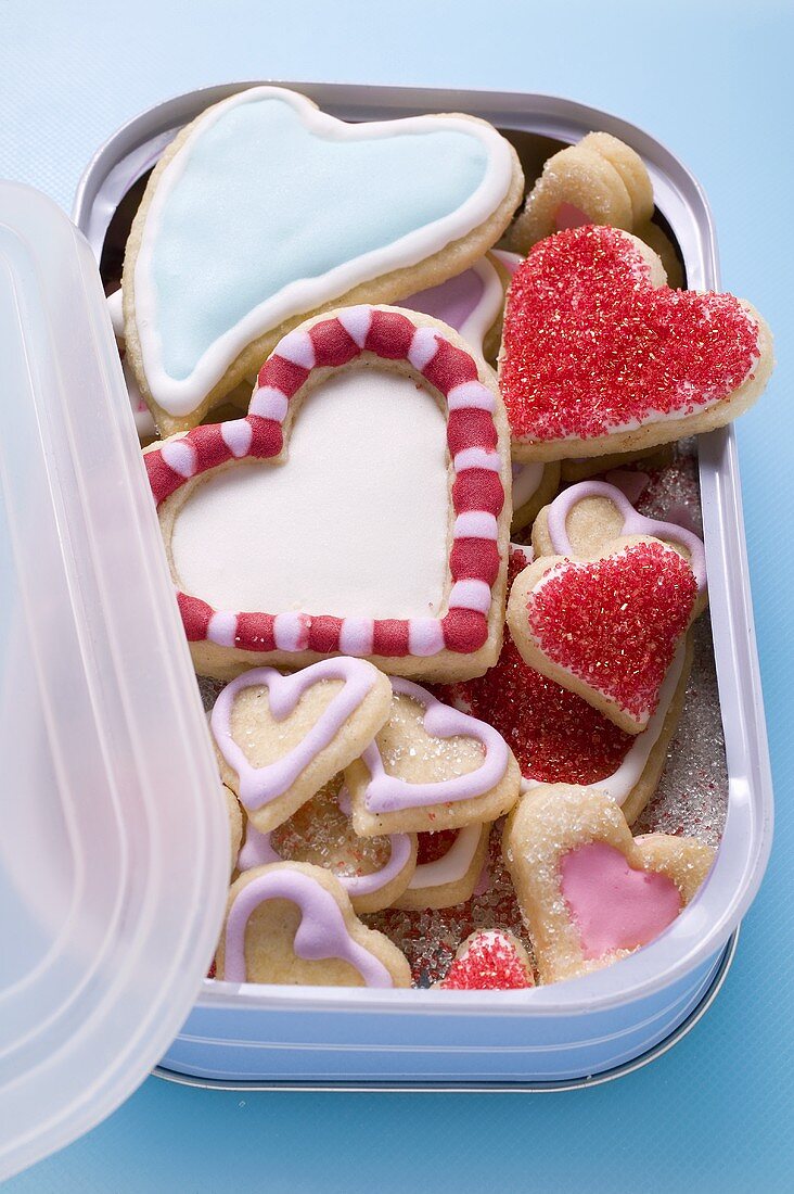 Assorted heart-shaped biscuits in biscuit box