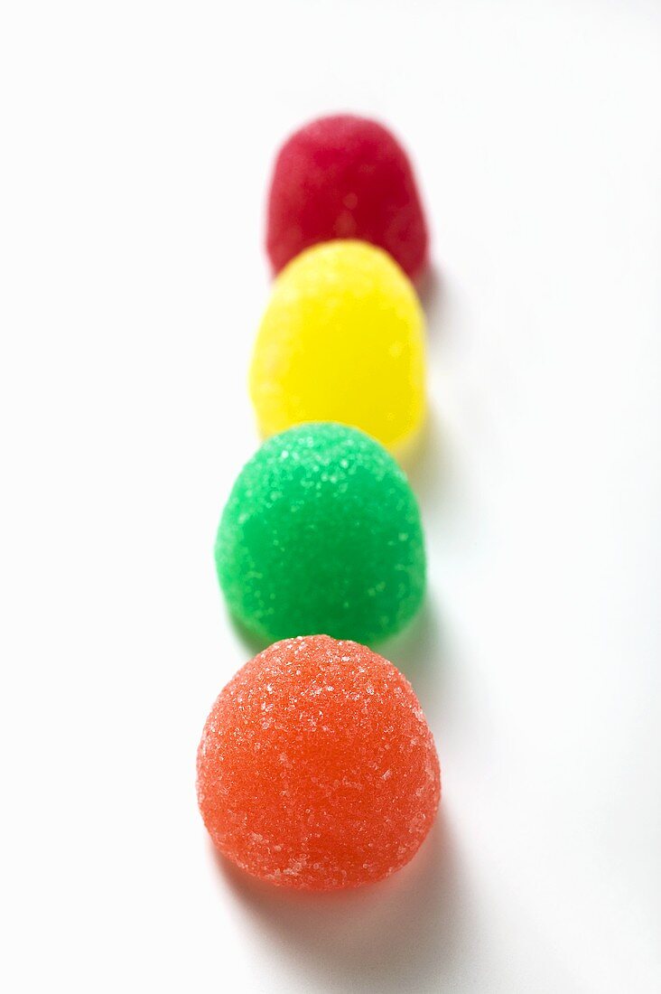 Coloured jelly sweets in a row
