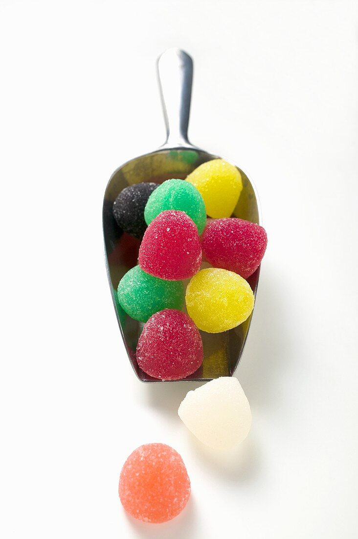 Coloured jelly sweets in metal scoop