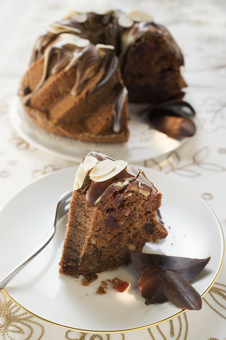 Gugelhupf with whisky, chocolate cream and flaked almonds