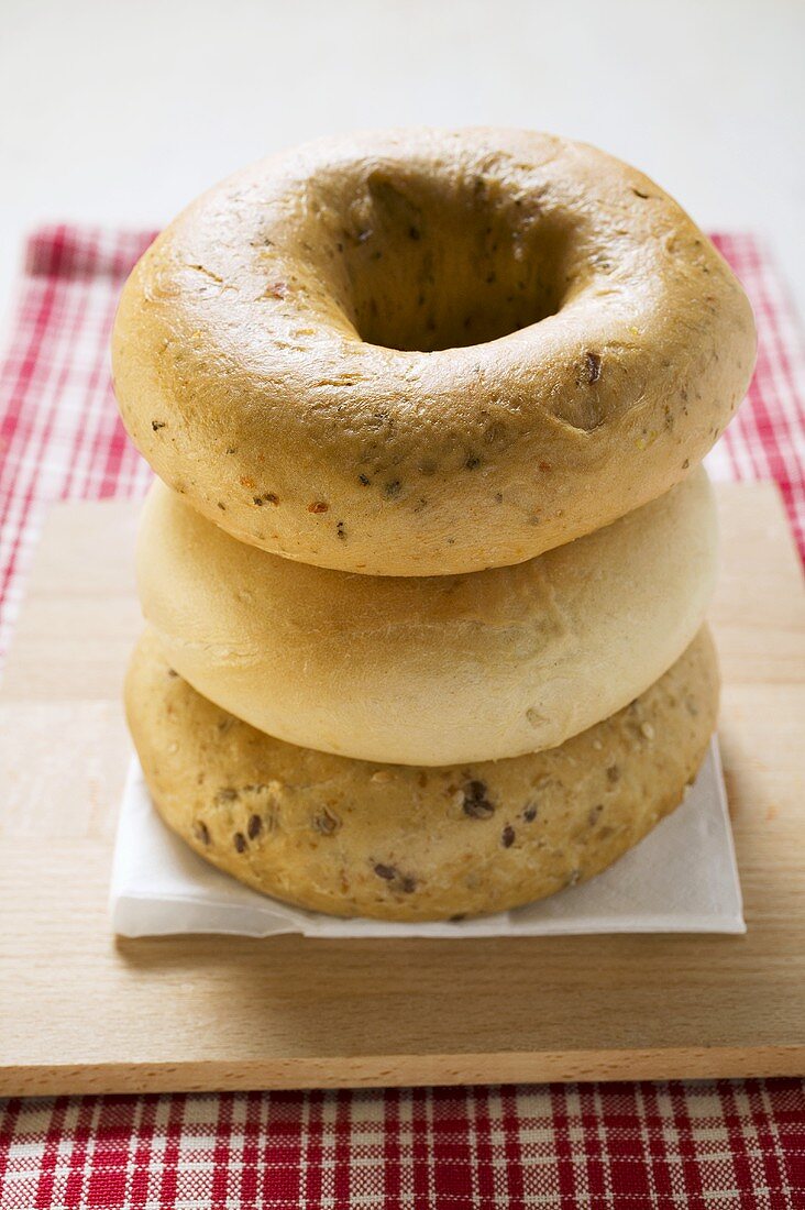 Three different bagels, in a pile