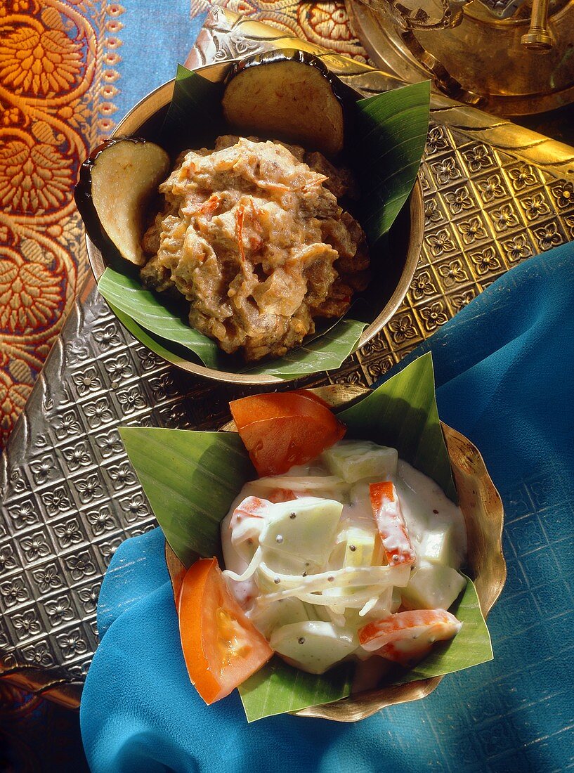 Aubergine salad and cucumber and tomato salad