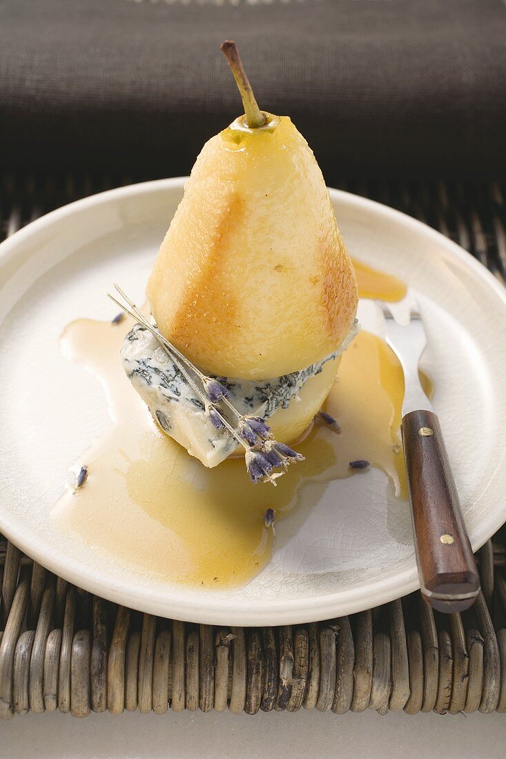 Poached pear with blue cheese and lavender flowers