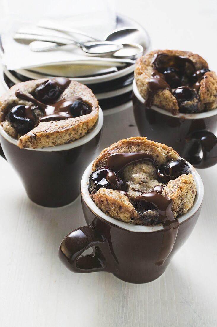 Chocolate and amarena puddings in espresso cups