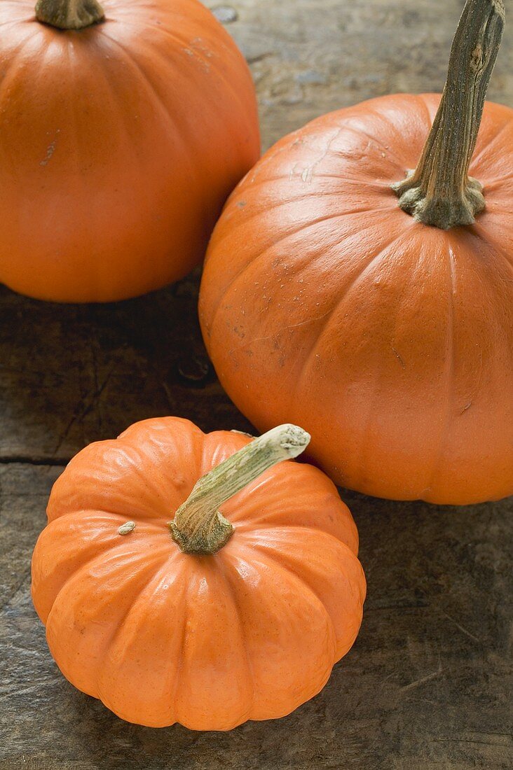 Three orange pumpkins