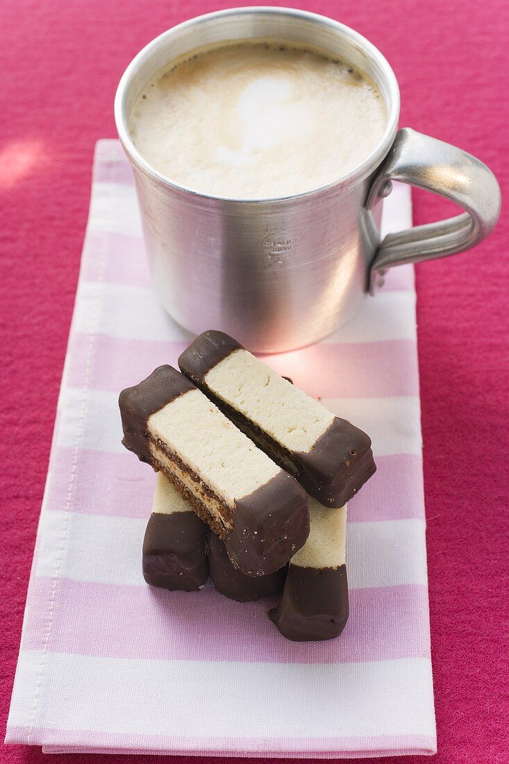 Layered chocolate and plain fingers with coffee