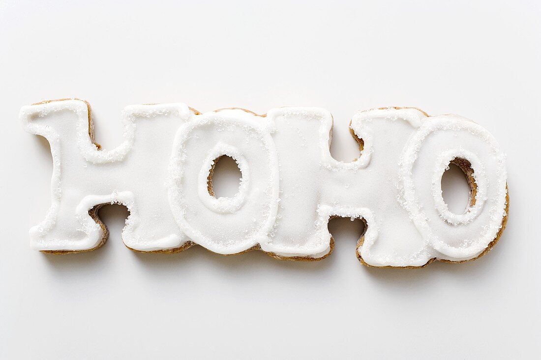 The word HOHO in gingerbread with white icing