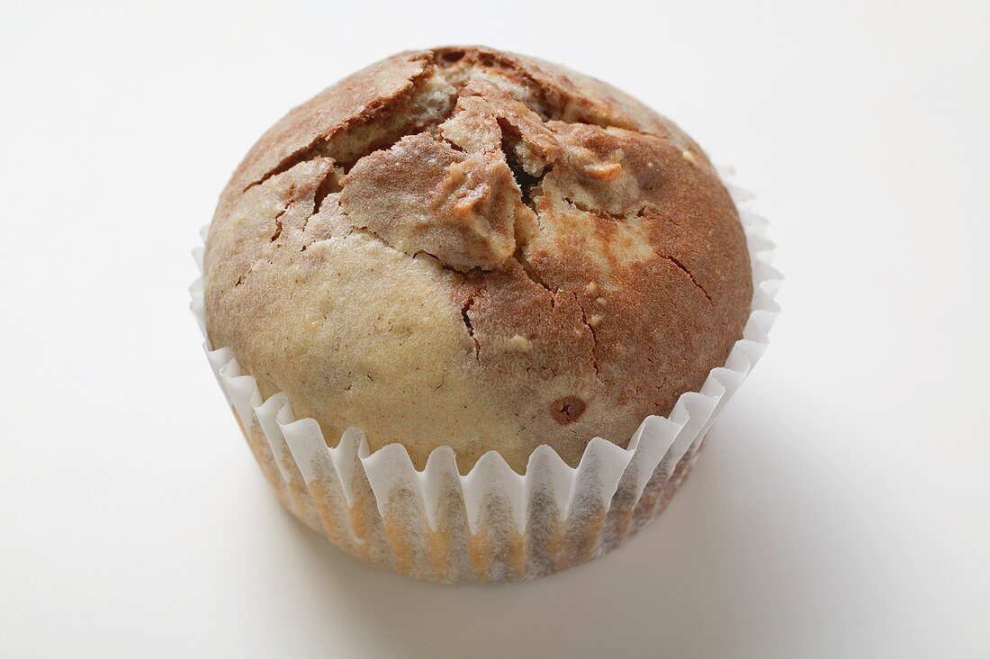 One chocolate and vanilla muffin in a paper case