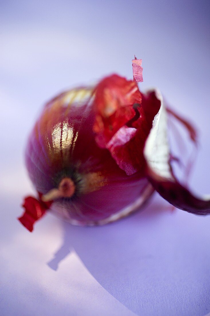 Red onion, partly peeled