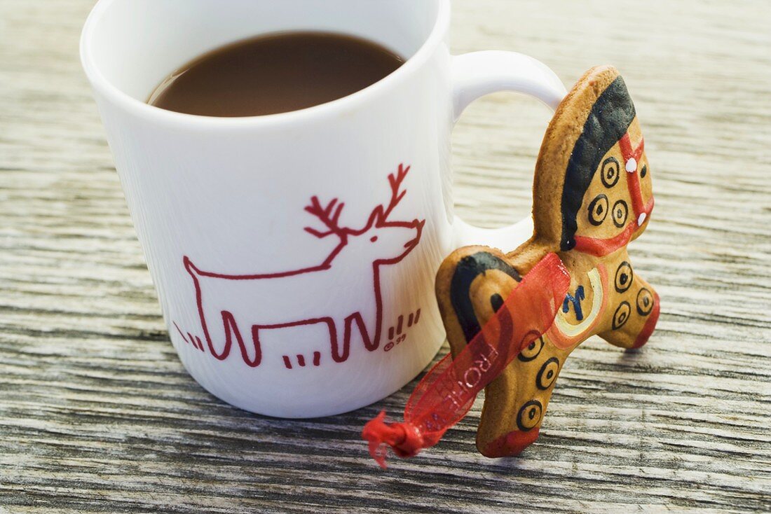 Gingerbread horse and cup of cocoa