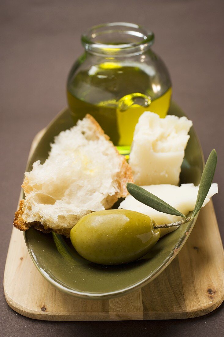 Green olive, white bread, Parmesan and olive oil