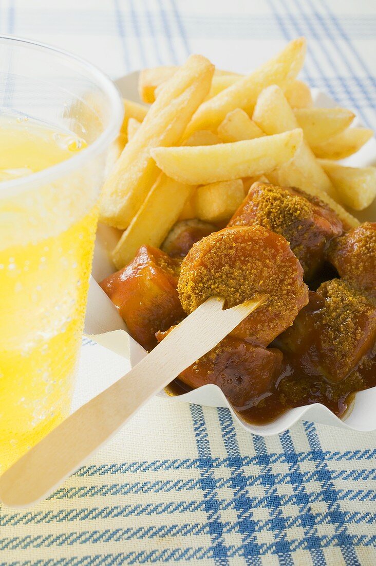 Currywurst (sausage with ketchup & curry powder) & chips, lemonade