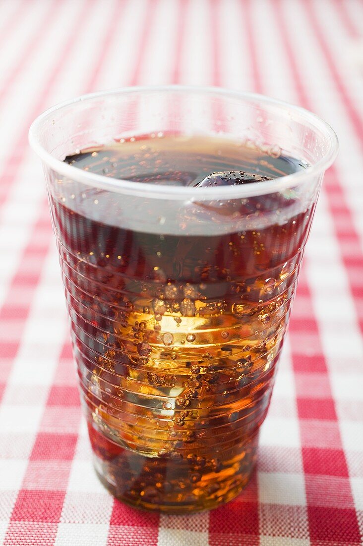 Cola in a plastic beaker
