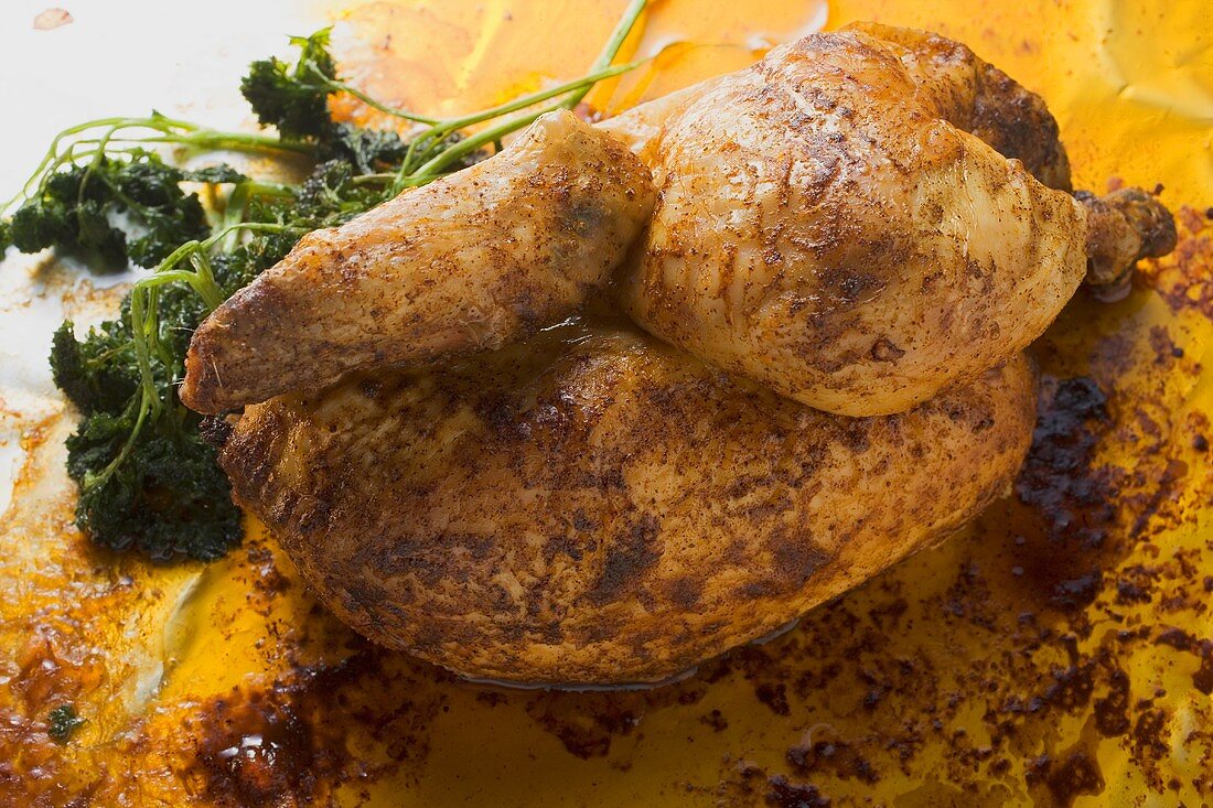 Half a roast chicken with parsley