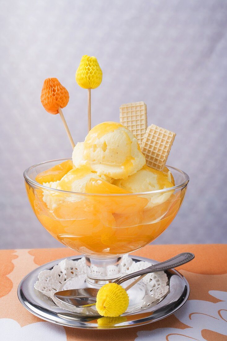 Fruity ice cream sundae with apricots