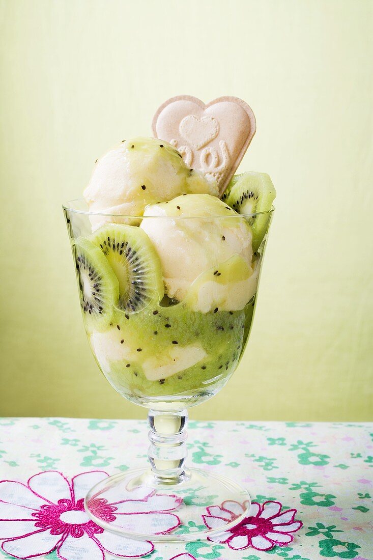 Ice cream sundae with vanilla ice cream and kiwi fruit