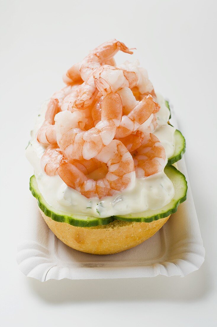 Half bread roll topped with shrimps, cucumber & remoulade