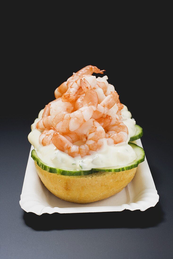 Half bread roll topped with shrimps, cucumber & remoulade