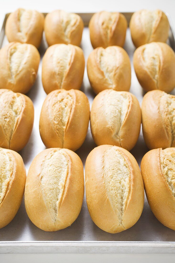 Baguette rolls on baking tray