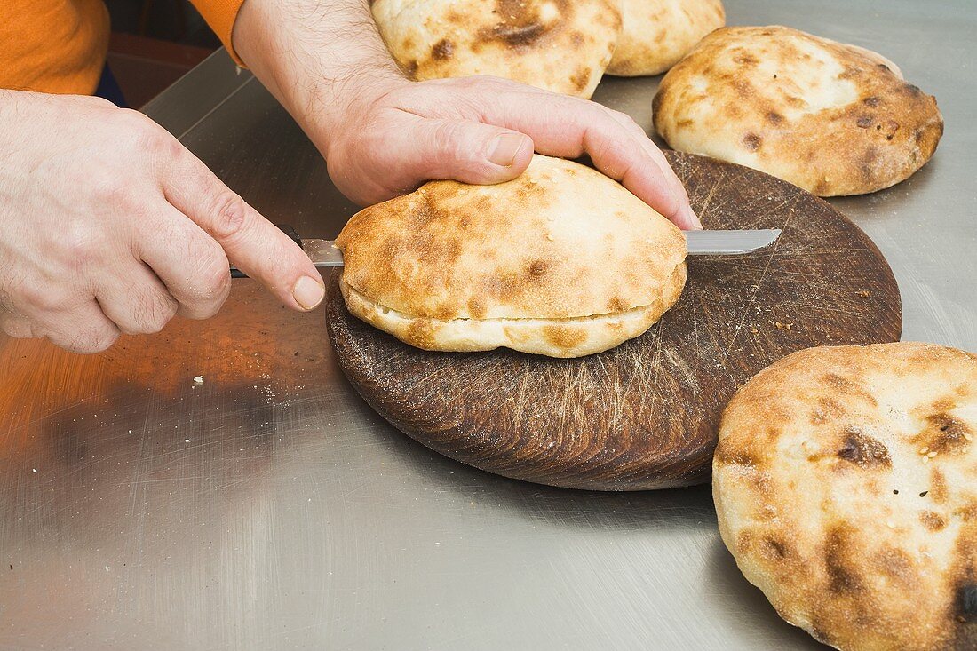 Splitting pita bread