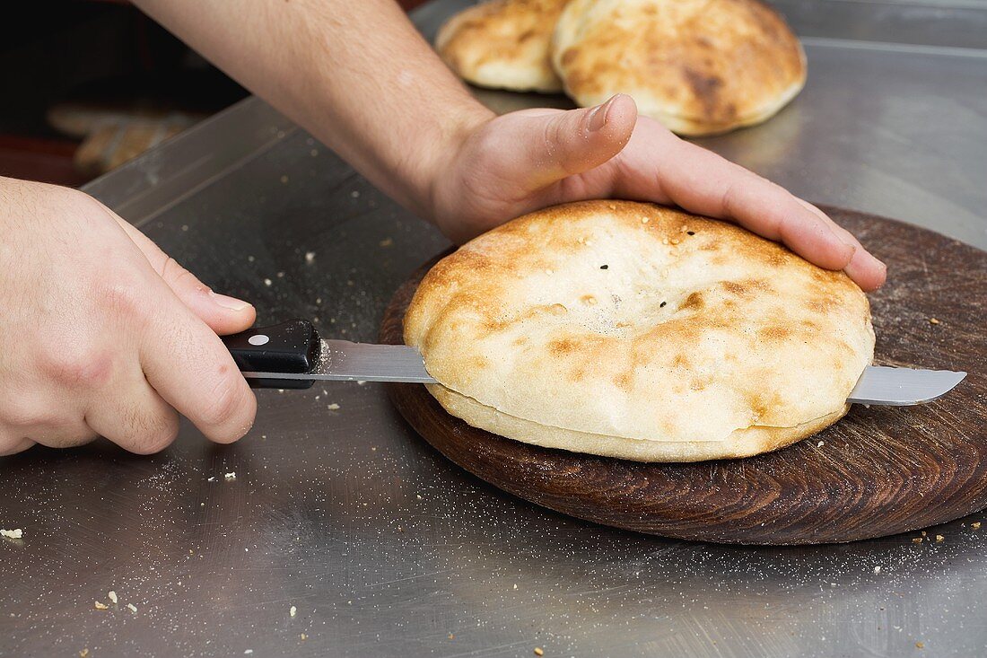 Splitting pita bread