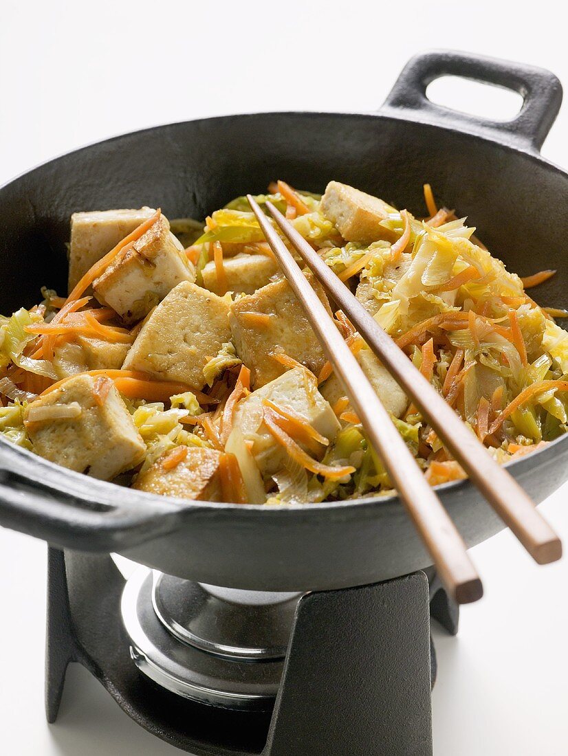 Tofu with vegetables in wok