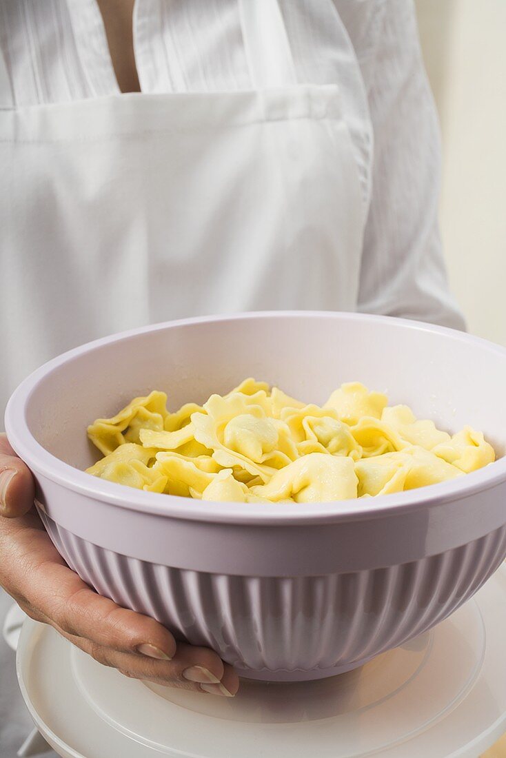 Serving bowl of cooked tortellini