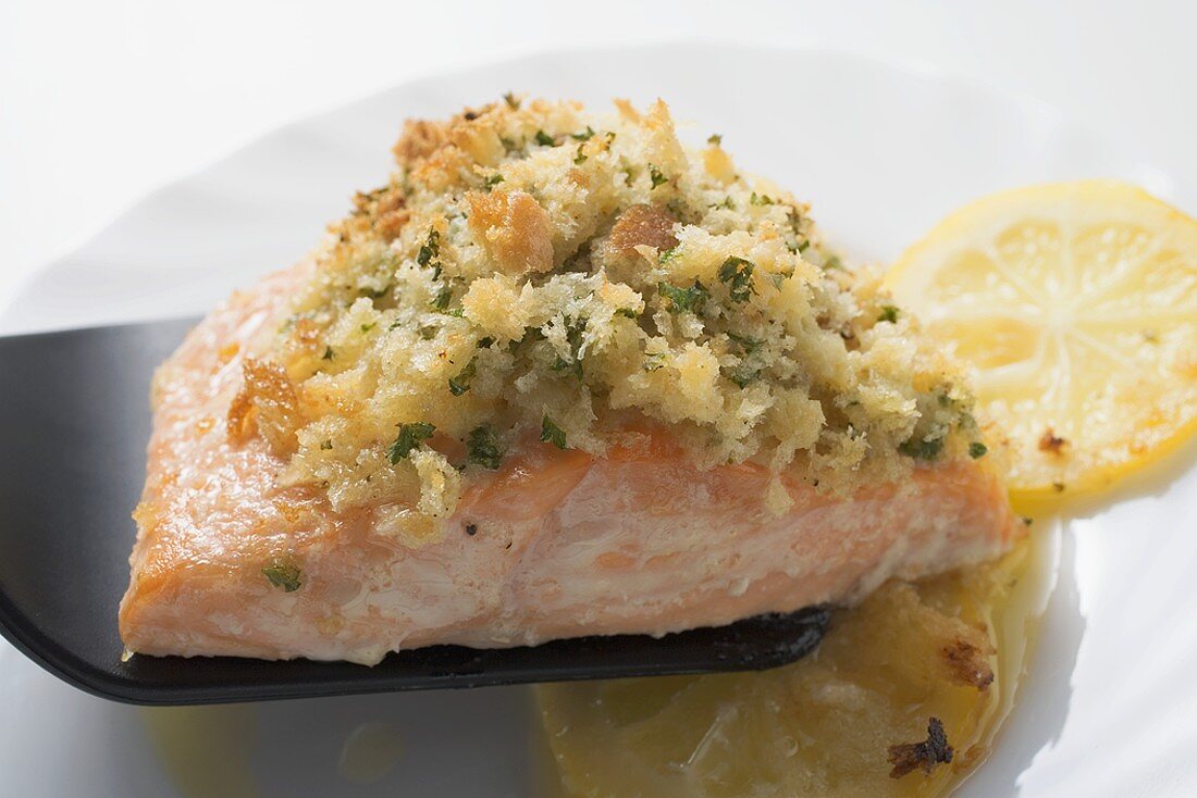 Baked salmon fillet on spatula