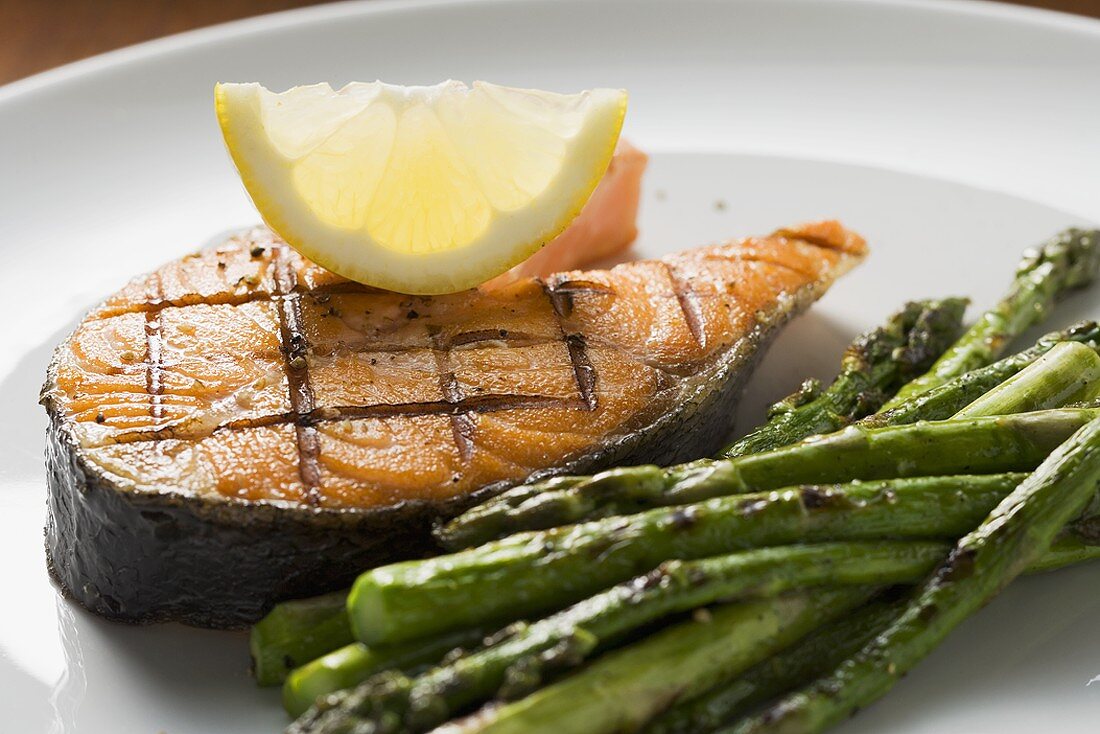 Grilled salmon cutlet with green asparagus