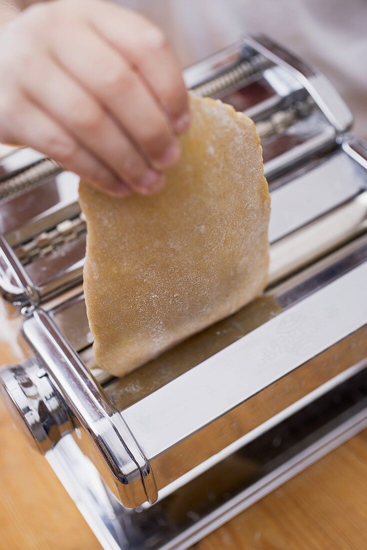 Making home-made pasta with pasta maker