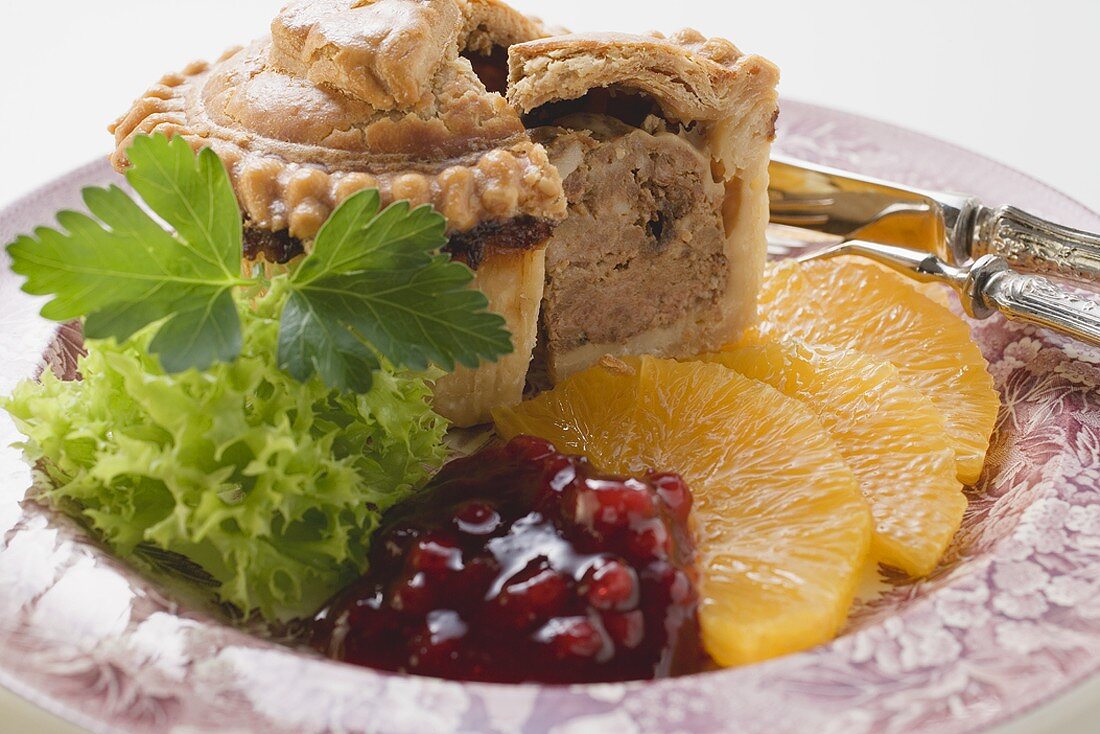 Meat pie with oranges and cranberries
