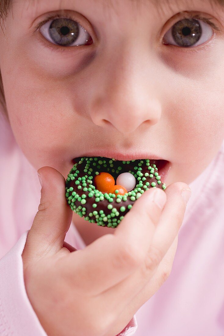 Child eating Easter sweet