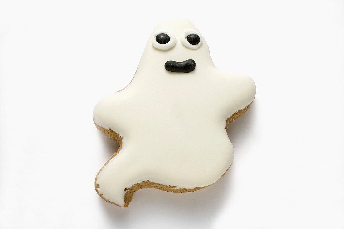 A ghost biscuit with white icing for Halloween