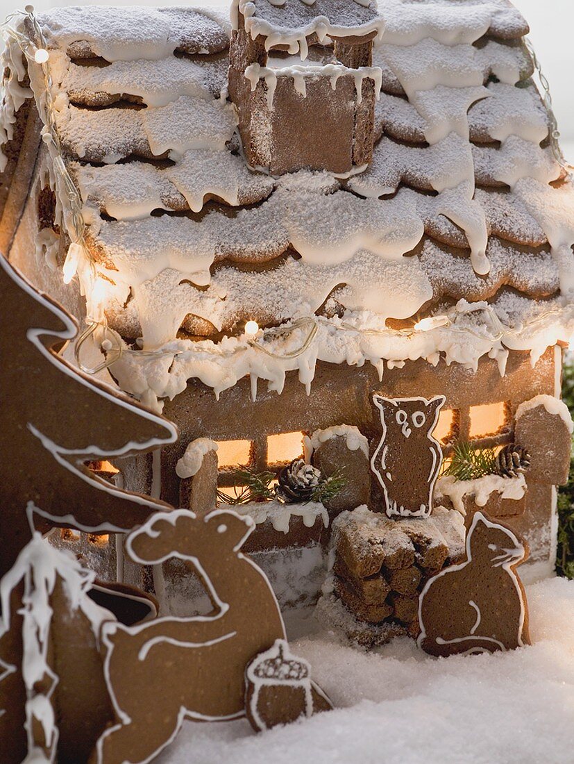 Gingerbread house with gingerbread animals