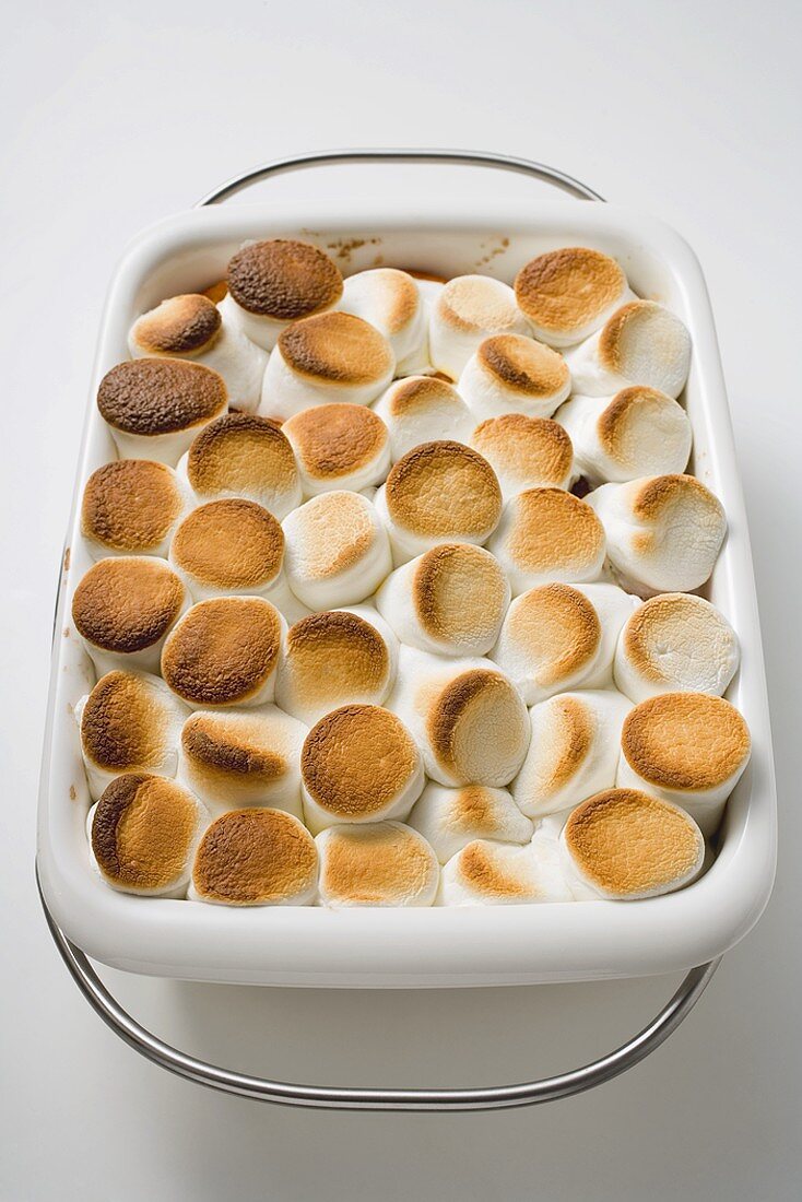 Sweet potato and marshmallow gratin in baking dish