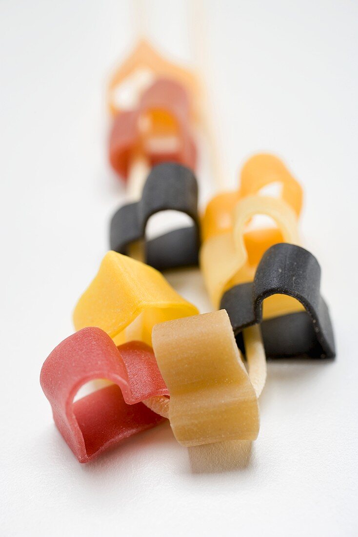 Several pieces of heart-shaped pasta