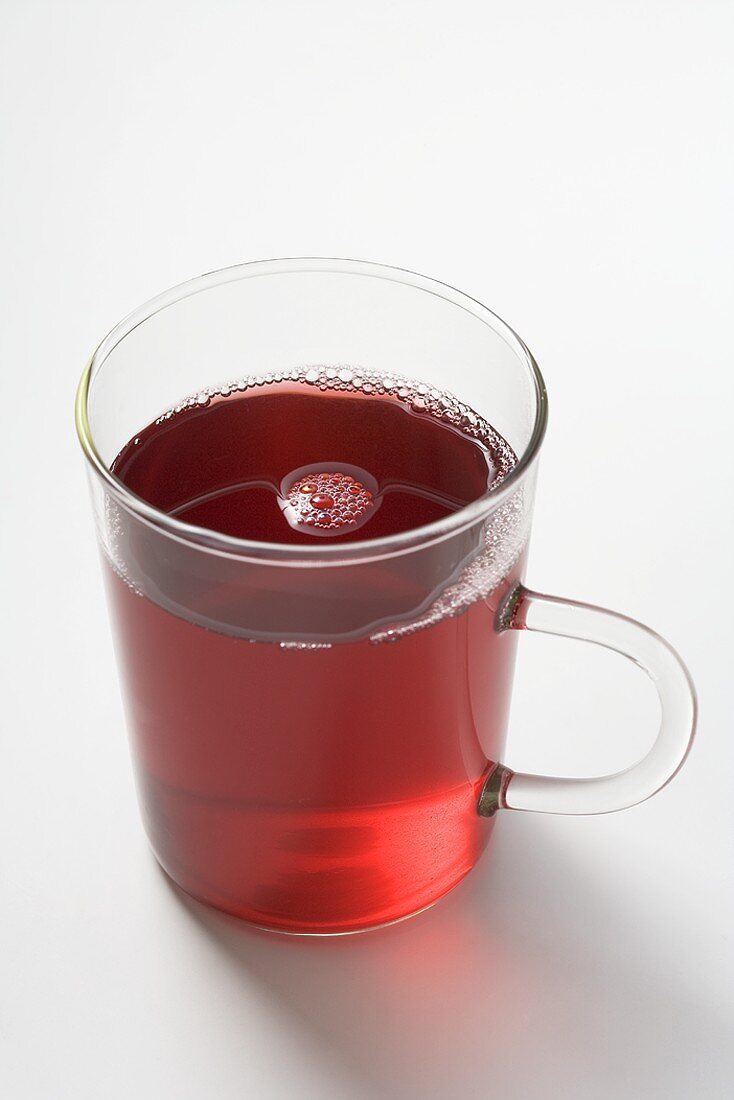Fruit tea in glass cup