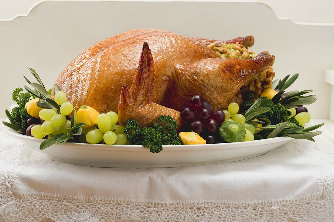 Stuffed turkey with herbs, grapes and patty pan squashes