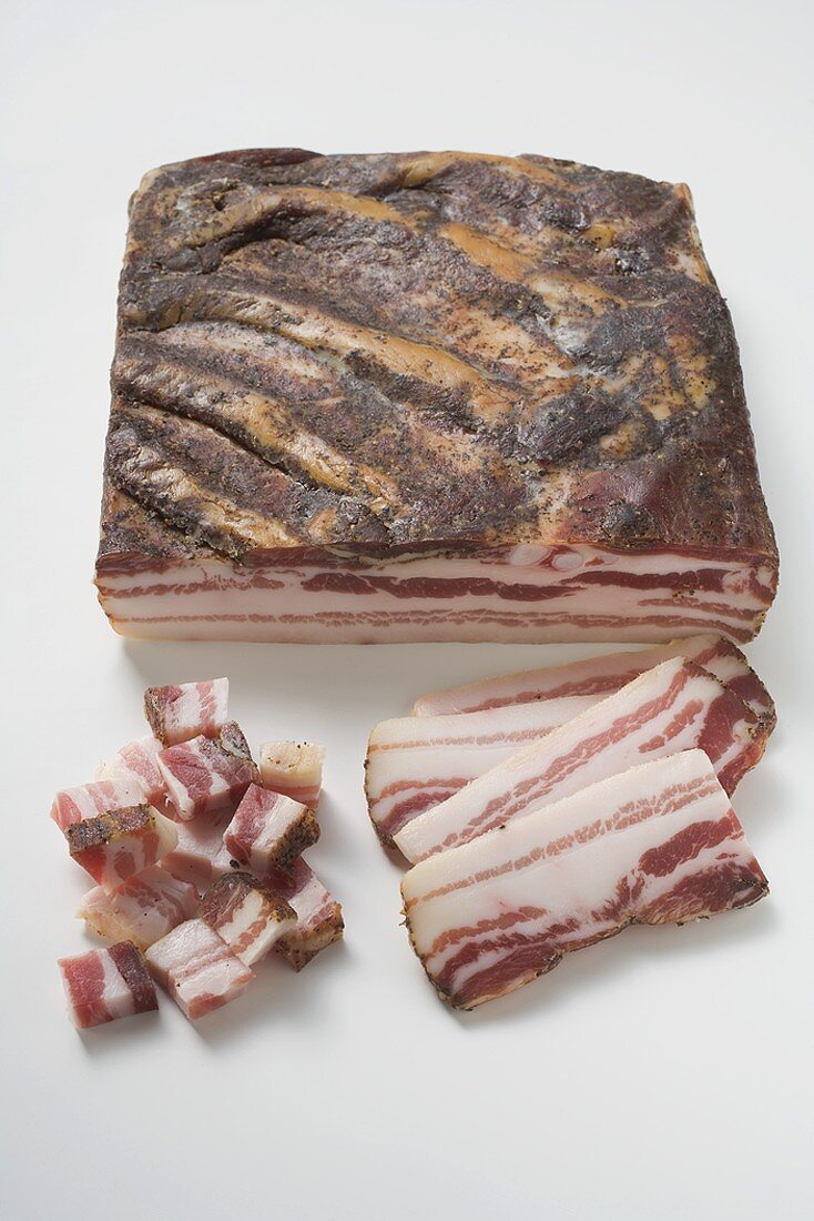 Piece of bacon, diced bacon and slices of bacon