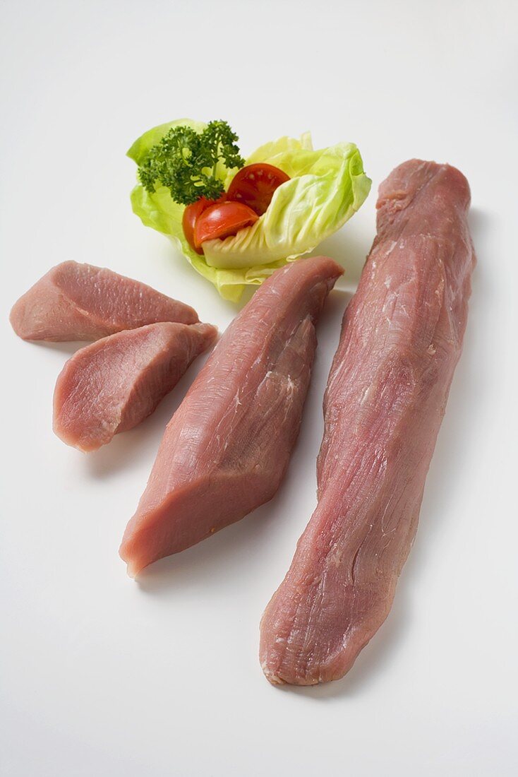 Pork fillets with parsley, tomato and lettuce leaf