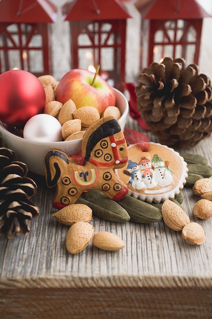 Gingerbread tree ornaments, almonds, gloves, cones, lanterns