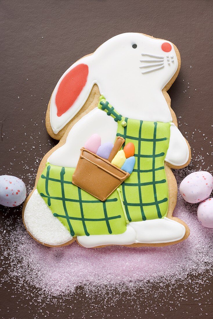Easter biscuit (Easter Bunny), pink sugar and sugar eggs