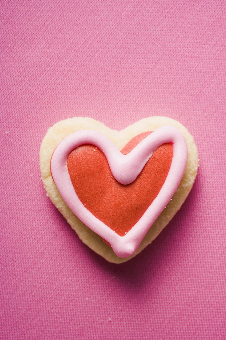 Heart-shaped iced biscuit