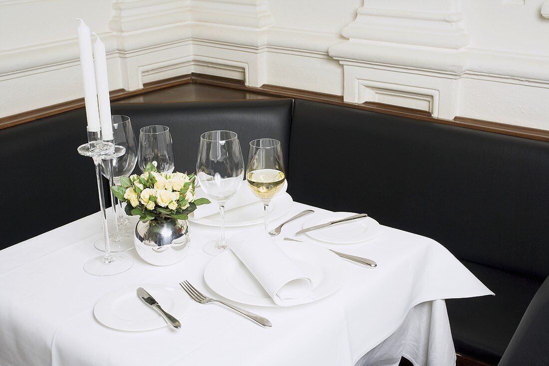 Table laid for two in restaurant